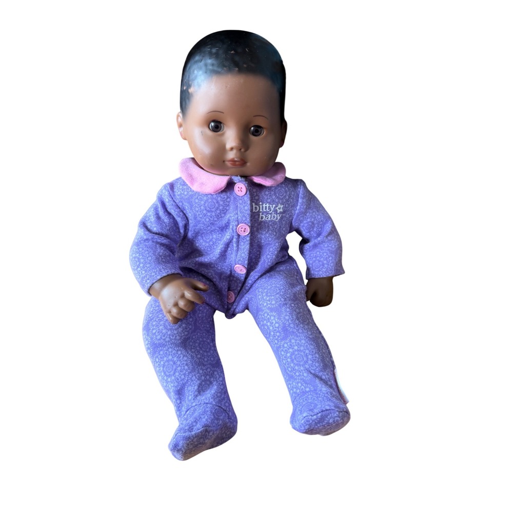 American Girl Bitty Baby black hair doll with purple one piece outfit